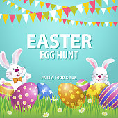 An invitation to the Easter egg hunt party with bunnies at the grassland