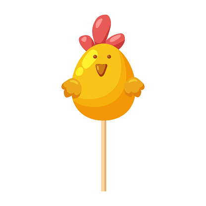 Easter lollipop, cute golden chicken on stick. Sweet food