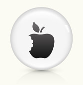 Eaten Apple Icon on simple white round button. This 100% royalty free vector button is circular in shape and the icon is the primary subject of the composition. There is a slight reflection visible at the bottom.