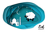 Eid-Al-Adha Greeting card design with paper cut cute Baby Sheep for Muslim Community. Origami Festival of Sacrifice. Eid Mubarak. Blue background. white ram. Vector