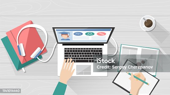istock E-learning, education and university banner, student s desktop with laptop, books and hands, top view 1141014440