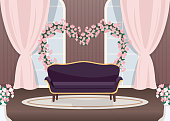 Elegant wedding photozone flat color vector illustration. Elegant couch. Luxurious sofa. Floral arch in heart shape. Romantic photo zone. Event hall 2D cartoon landscape with sea on background