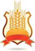 Vector illustration of bread and ears on the shield with a ribbon