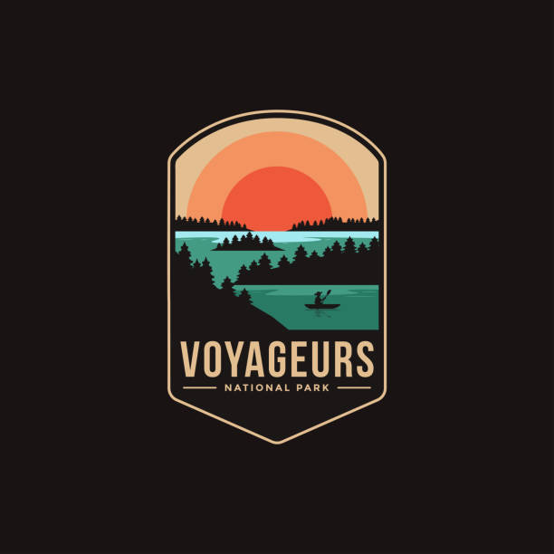 emblem patch vector illustration of voyageurs national park on dark background - 獨木舟 幅插畫檔、美工圖案、卡通及圖標