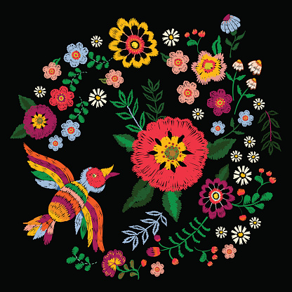 Embroidery ethnic colorful pattern with bird and fantasy flowers.