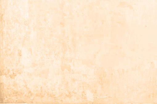 Empty and blank dirty peach brown or beige coloured grunge textured horizontal old faded and weathered vector backgrounds abstract light smudges all over like a damp wall with seepage