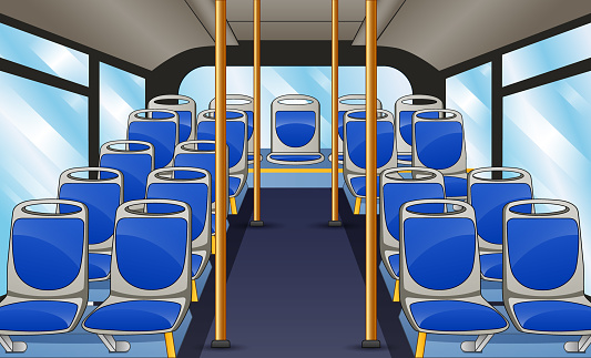 Empty bus interior with blue seats and bus handle