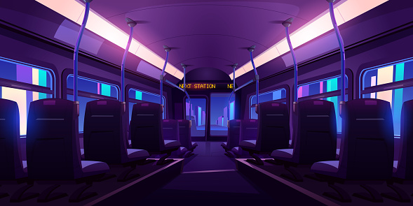 Empty bus or train interior with chairs at night