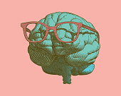 Pastel retro pop art engraving human brain with eye glasses illustration in front view isolated on pastel pink background