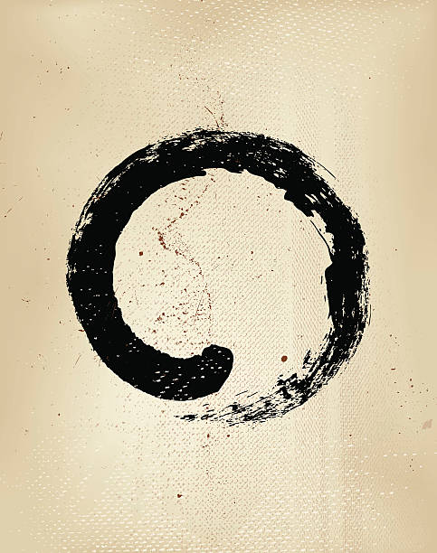 Ensō character in black on a grunge, beige, chamois paper background. Ensō means circle in Japanese. It is a circular brushstroke used in Japanese calligraphy and represents the state of mind at the moment of creation and symbolizes absolute enlightenment, strength, elegance, the universe, and the void. Comparable to the Taoist sign of yin and yang.
