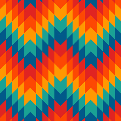 Ethnic style seamless pattern with chevron lines. Native americans ornamental background. Tribal motif. Colorful mosaic