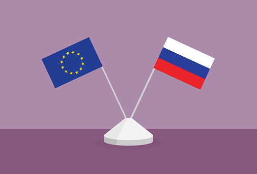 Euro and Russia flag on a table