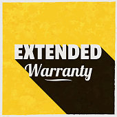 istock Extended Warranty. Icon with long shadow on textured yellow background 1400309528