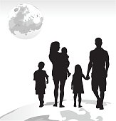 A vector silhouette illustration of a young familyincluding a mother, father, son, daughter, and infant walking on the earth looking at the moon.