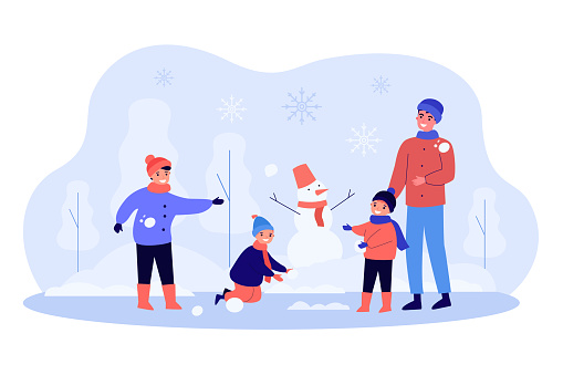 Father with children having snowball fight