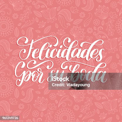 istock Felicidades Por Su Boda translated from Spanish handwritten phrase Congratulations For Your Wedding on pink background. 961249726