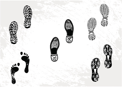 Five footprints including shoes and sneakers