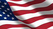 istock US flag flutters in the wind. USA flag with red and white stripes and stars on the blue part of the fabric closeup. Beautiful Americah Flag 1344490533