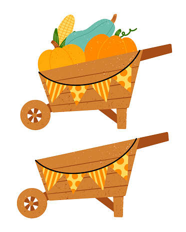 Flat vector illustration of a cartoon autumn harvest wheelbarrow with vegetables