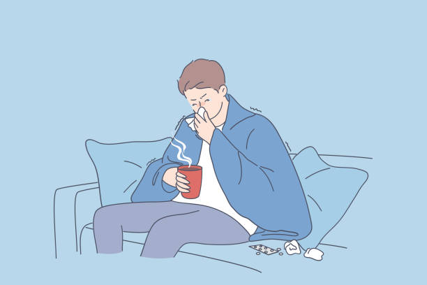 Flu, fever, infection concept Flu, fever, infection concept. Sad man cartoon character sitting on sofa in warm blanket with hot drink and feeling ill sick and flu sneezing vector illustration one man only stock illustrations