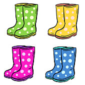 istock Garden Wellington Boots Cartoon Illustration Wellies in Yellow Pink Blue and Green with Spots 1386450459
