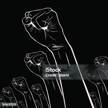 istock Gesturing(Hand Sign): Clenched fists held high in protest 165630259
