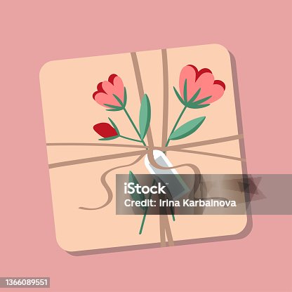 istock Gift box in craft paper on an isolated pink background. 1366089551