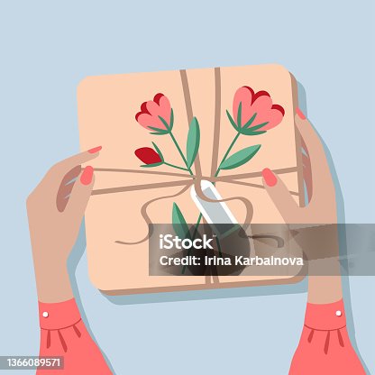 istock Gift box on the table, top view. 1366089571