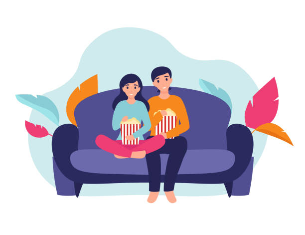 girl and man with popcorn on the couch Couple woman and man at home sitting on sofa, watching movie and eating popcorn together. Flat vector cartoon illustration home comfort concept. date night stock illustrations