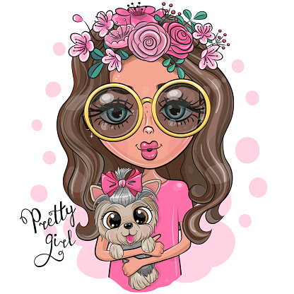 Girl in glasses with flowers holds a Yorkshire terrier in her arms