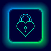 istock Glowing neon line Castle in the shape of a heart icon isolated on black background. Locked Heart. Love symbol and keyhole sign. Colorful outline concept. Vector 1361238568