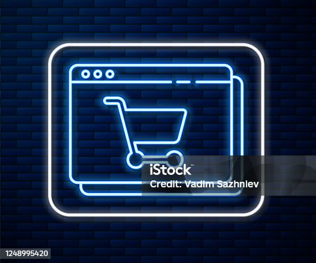 istock Glowing neon line Online shopping on screen icon isolated on brick wall background. Concept e-commerce, e-business, online business marketing. Vector Illustration 1248995420