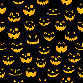 istock Glowing Pumpkin Faces Seamless Pattern 1277680190