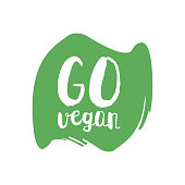 Go green letters in grunge round background. Vector logo illustration.