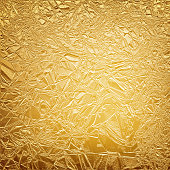 Gold leaf. Christmas golden wrapper. Gold textured backdrop, banner.  Holiday foil vector background