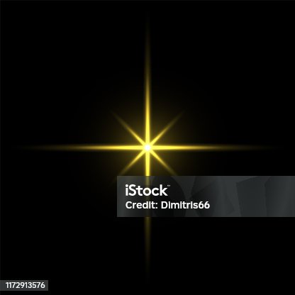 istock Gold light star on black background 1172913576