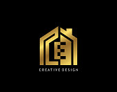 Golden E Letter Logo. Minimalist gold house shape with negative E letter, Real Estate Building Icon Design.