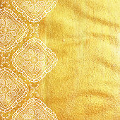 Vector golden foil background template for cards, hand drawn backdrop for invitations and posters, with ornate border white lace and copy space.