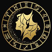 The sign of Gemini in the Golden round frame on a dark background