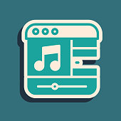 istock Green Music player icon isolated on green background. Portable music device. Long shadow style. Vector 1361289453