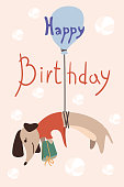 Greeting card with cute Dachshund with gift of flying in a hot air balloon. Birthday poster with a funny little dog. Vector illustration in a trendy flat style