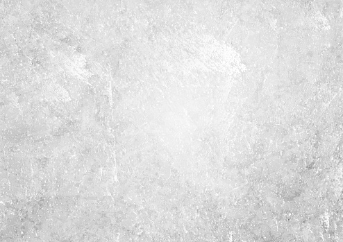 Grey white grunge textural concrete wall background