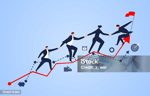 istock A group of businessmen holding hands on a business chart 1246076365