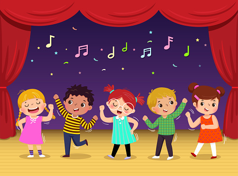 Group of kids dancing and singing a song on the stage. Childrenâs performance.