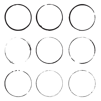 Grunge circles . Black round frames on a white background. Design element ring stains.
