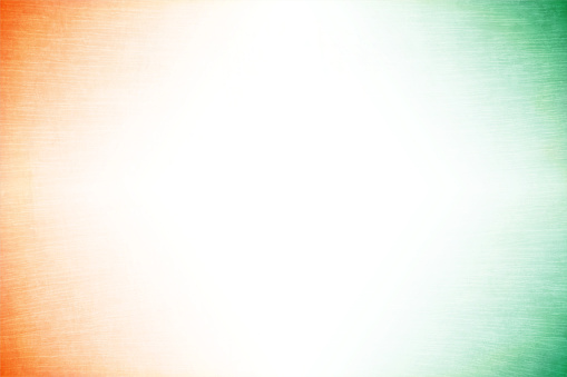 Grunge vector tricolour background with an off white centre and orange or saffron and green colour at the corners