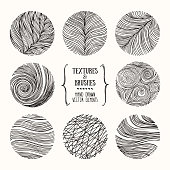 Hand drawn wavy linear textures made with ink. Artistic collection of graphic design elements. Swirl, circle, wavy stripe, abstract line, organic background, geometric pattern. Isolated vector set.