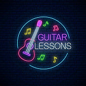 Guitar lessons glowing neon poster or banner template. Guitar training advertising flyer with circle frame in neon style on dark brick wall background. Vector illustration.