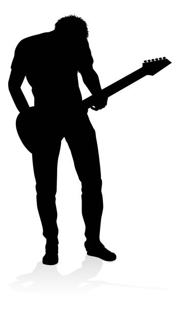 Guitarist Musician Silhouette A guitarist musician in detailed silhouette playing his guitar musical instrument. music silhouettes stock illustrations