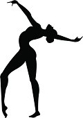 The silhouette of a gymnast in a stance.